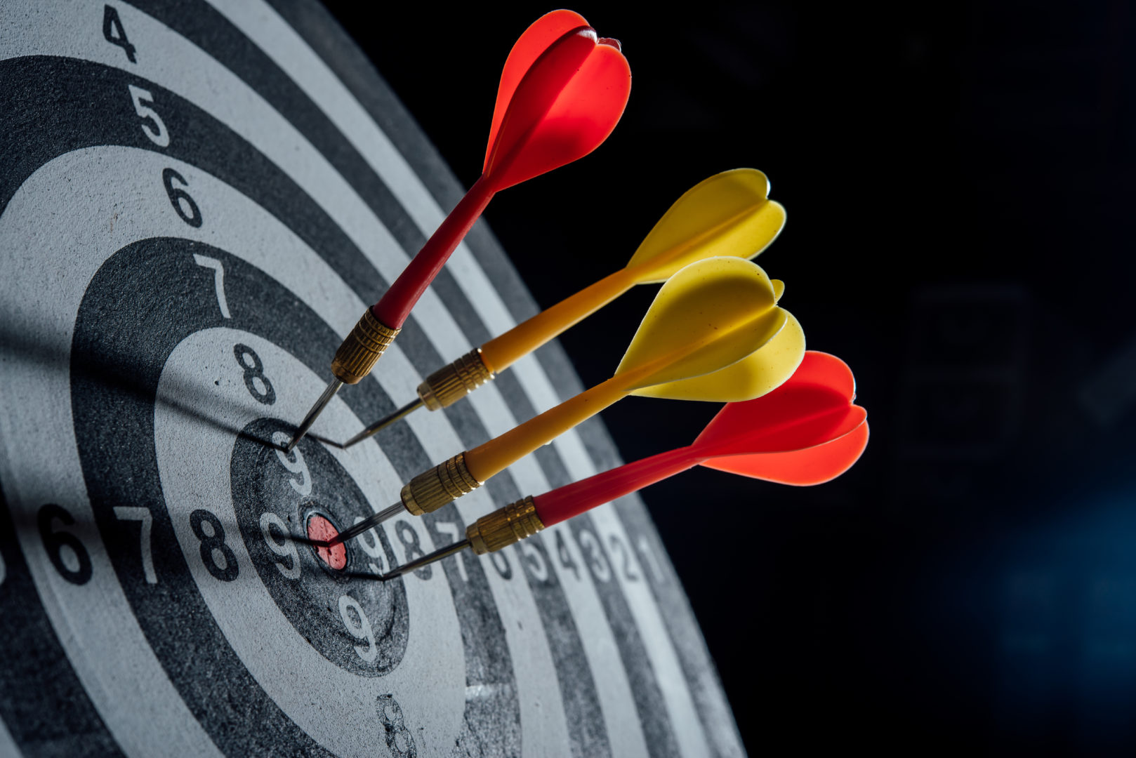 darts arrows in the target center business concept